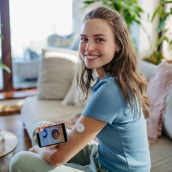 Woman with CGM device on her upper arm_square.jpg